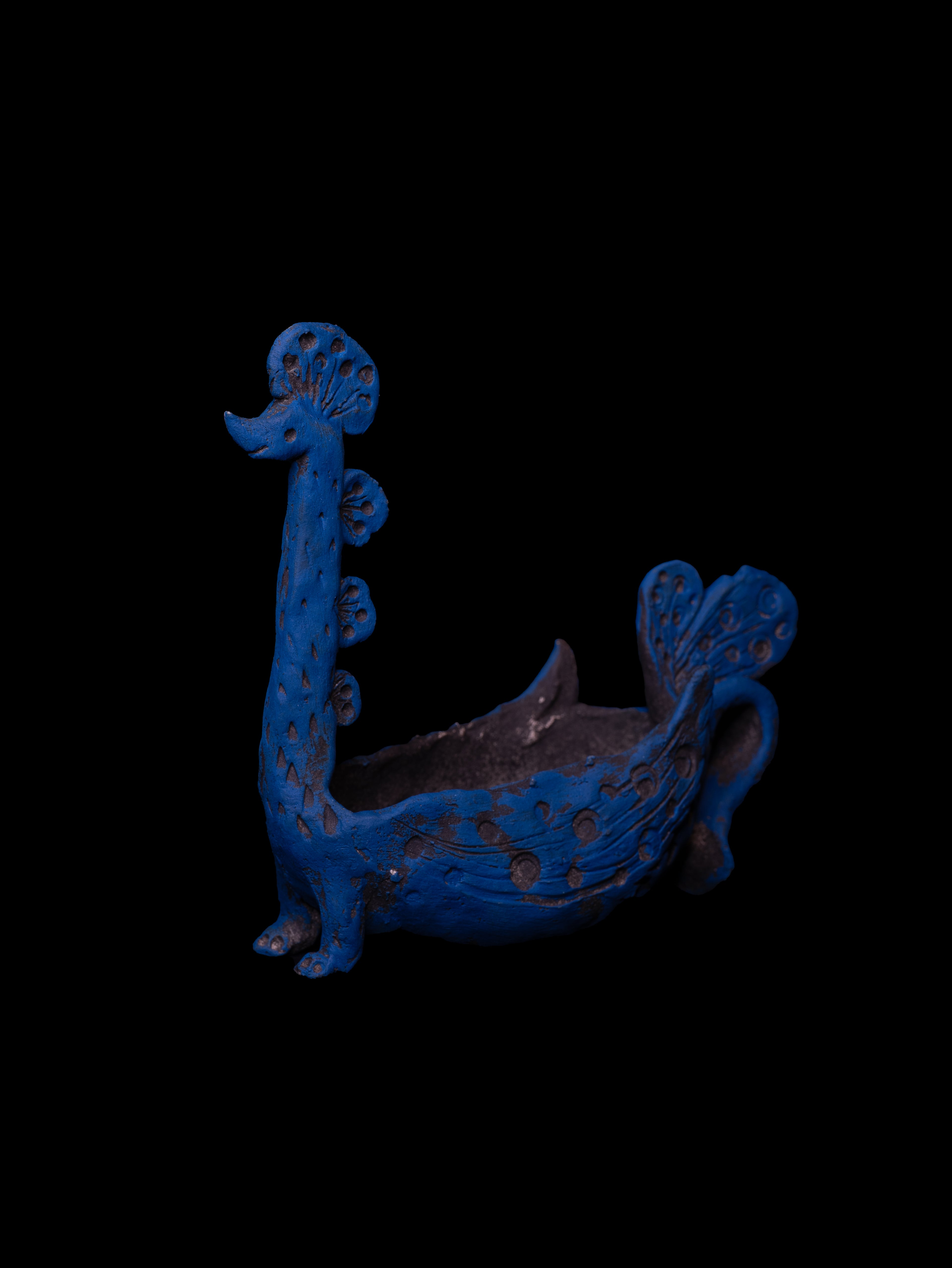 藍孔雀（あいくじゃく）